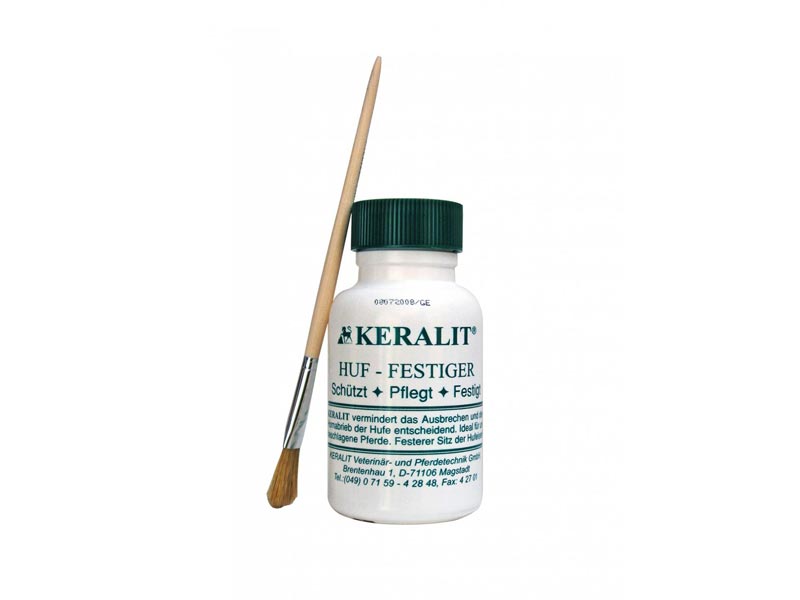 weiße Dose mit Pinsel und Aufschrift