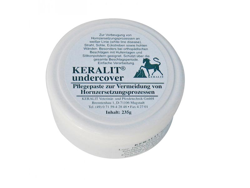 weiße Dose mit blauer Aufschrift