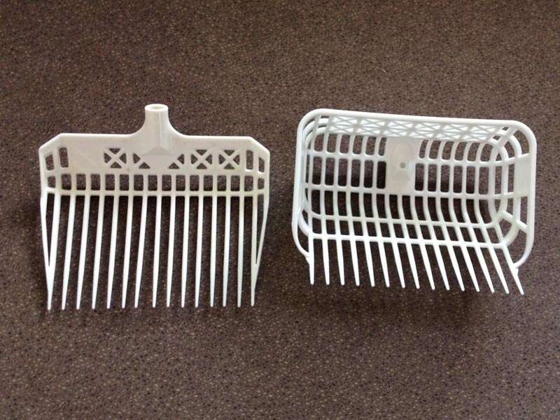 weiße Mistgabel aus Kunststoff